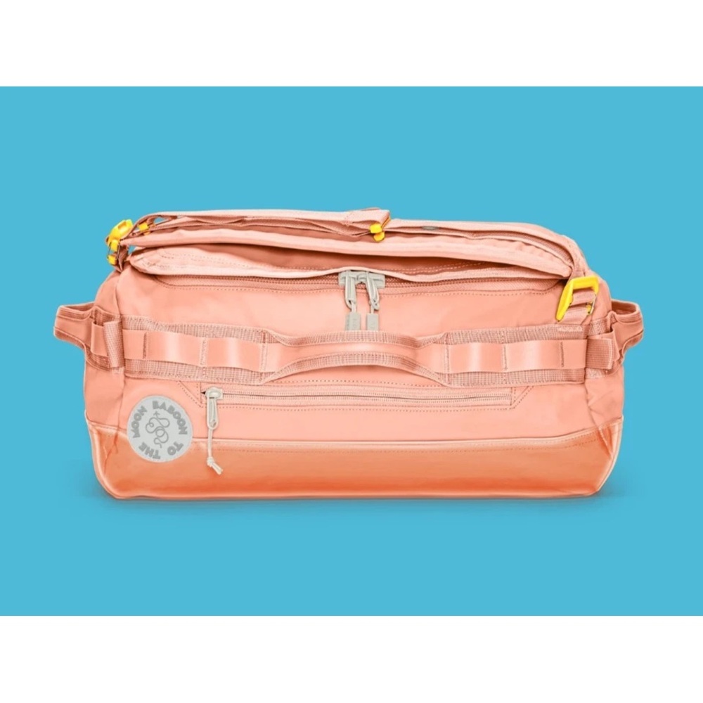 Baboon to the Moon go bag mini in sunset coral 32L
